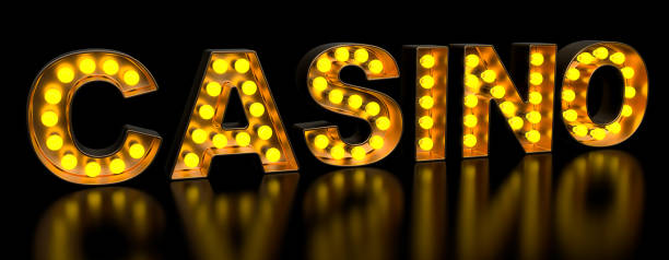 istock Casino signboard from golden light bulb letters, retro glowing font. 3D rendering 1147385874