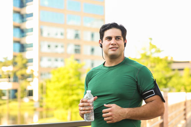 istock Latin descent man exercising in downtown city area. 1147389036