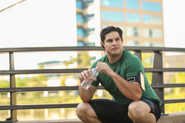 istock Latin descent man exercising in downtown city area. 1147389731