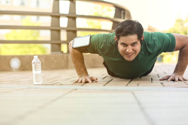 istock Latin descent man exercising in downtown city area. 1147389815