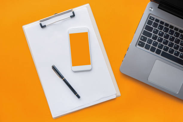 istock Top view of creative business workspace with clipboard notepad 1147391336