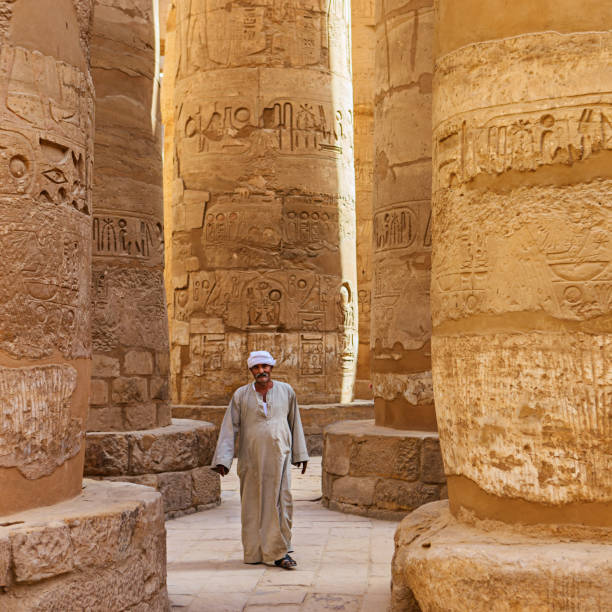 istock Egyptian man in ancient temple, Egypt 1147396003
