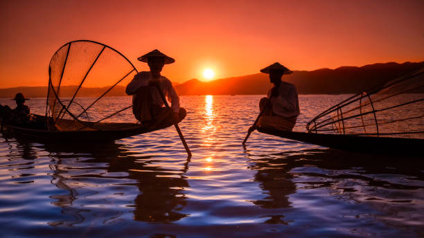 istock Fishermen on Inle Lake watching the sunset, Myanmar 1147396267