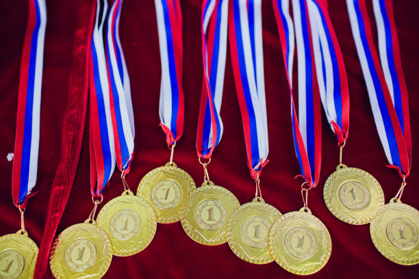 istock Golden medals background red 1147400162