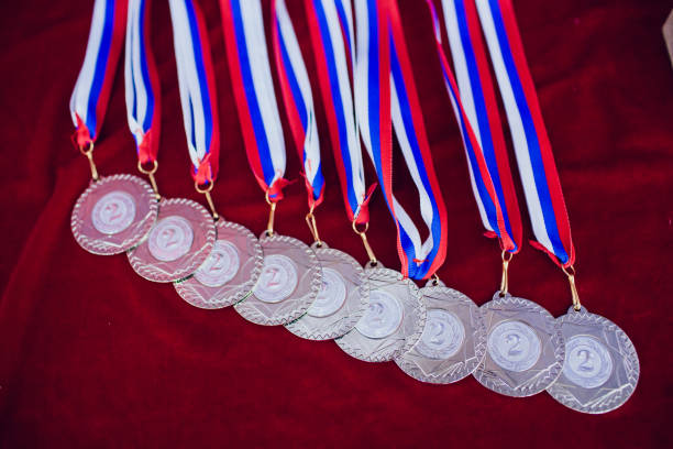 istock Golden medals background red 1147400183