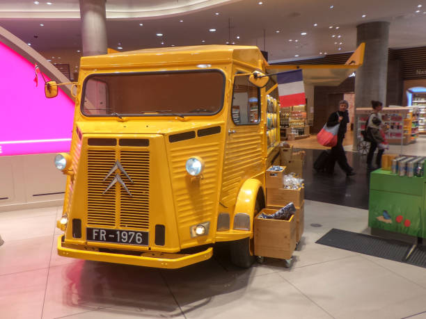 Yellow Vintage Citroen HY Arlanda Airport, Stockholm, Sweden - May 13, 2017: Retro styled image of a Vintage Citroen HY on Arlanda airport duty-free. citroen hy stock pictures, royalty-free photos & images