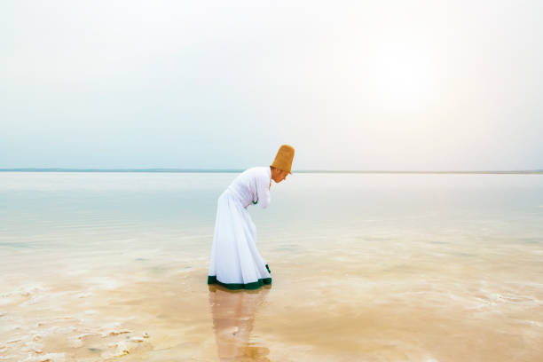 istock sunset and whirling at the sea, sufi. 1147403335