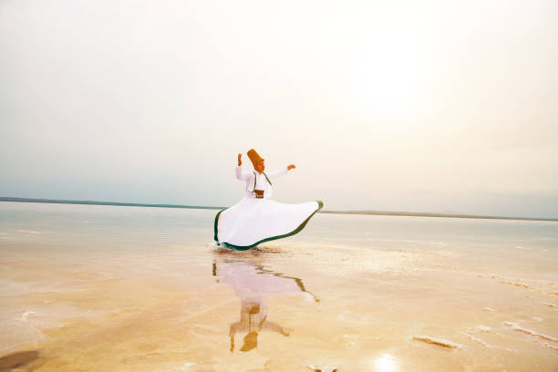 istock sunset and whirling at the sea, sufi. 1147403338