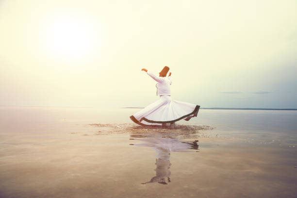 istock sunset and whirling at the sea, sufi. 1147403345