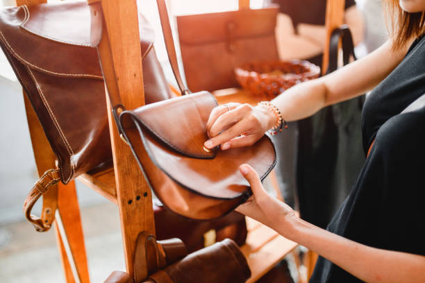 handmade vintage crafted authentic leather high quality woman handbag on the sale at the window in shop - craft market morocco shoe imagens e fotografias de stock