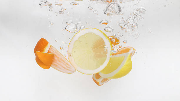 istock orange and lemon in the water 1147407394