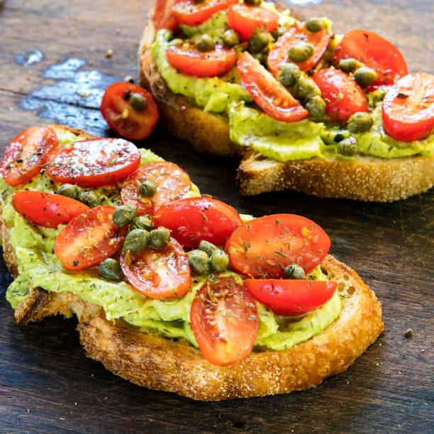 istock Avocado Toast with Cherry Tomato and Caper Salsa 1147411097