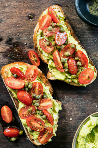 istock Avocado Toast with Cherry Tomato and Caper Salsa 1147411386
