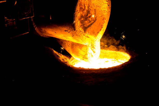 istock metal casting process with red high temperature fire in metal part factory 1147420952