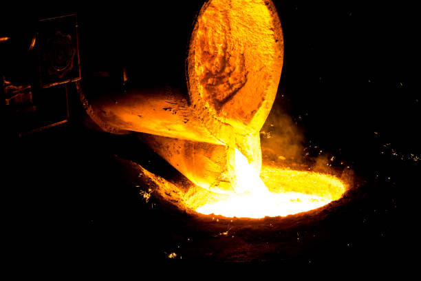 istock metal casting process with red high temperature fire in metal part factory 1147420955