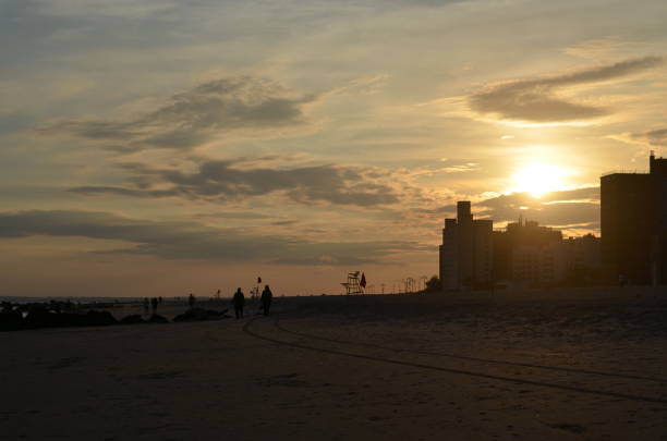 istock Coney Island beach sunset 1147423630