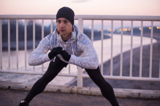 istock Man exercising in a city at sunrise 1147427985