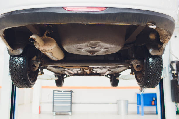 istock Car raised on car lift in autoservice. 1147429120