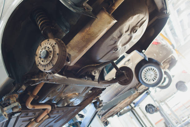 istock Car raised on car lift in autoservice. 1147429183