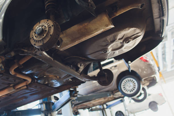 istock Car raised on car lift in autoservice. 1147429186