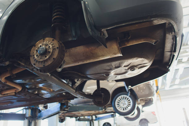 istock Car raised on car lift in autoservice. 1147429204