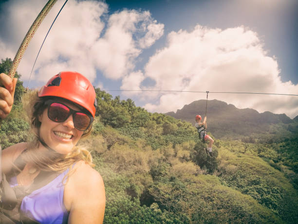 istock Ziplining Mama in the Jungle 1147429547