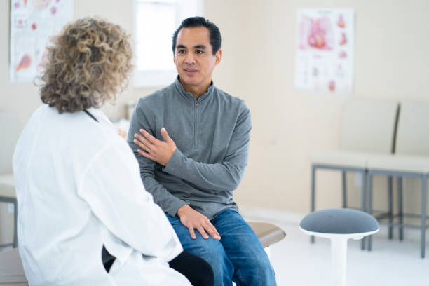 istock Latino patient talking to the doctor 1147430181