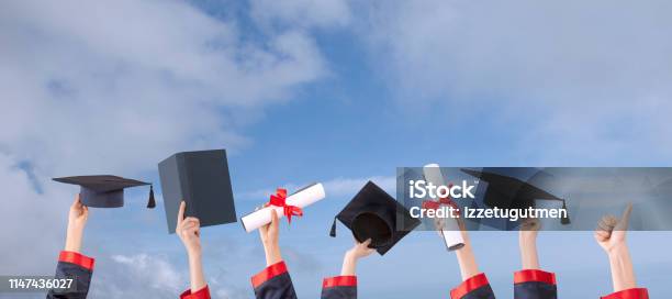 Graduation Ceremony Hats And Hands Up With Sunny Sky Stock Photo - Download Image Now