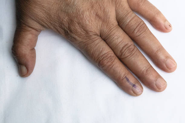 istock Senior citizen voted and got index finger inked 1147439709