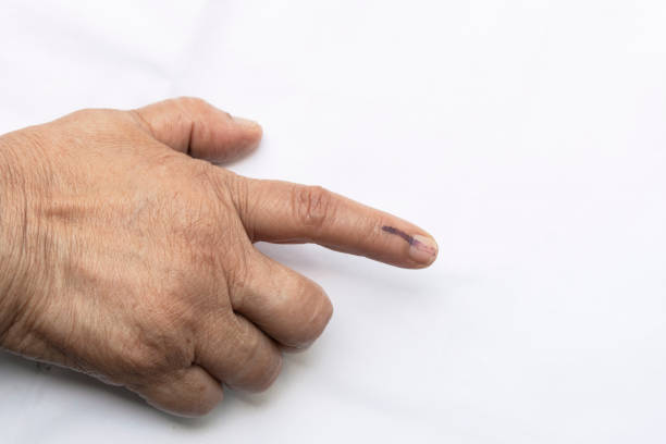 istock Senior citizen voted and got index finger inked 1147439722