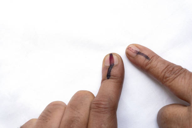 istock Indian citizens voted and got index fingers inked 1147439729