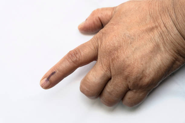 istock Senior citizen voted and got index finger inked 1147439730