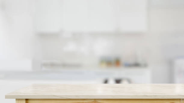 istock Brown wooden plate on marble counter table top in kitchen room 1147442026