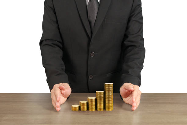 istock human hand putting coin to money 1147442142