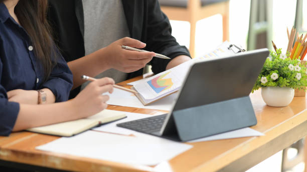 istock Business people working on digital tablet 1147442343