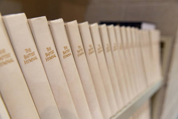istock Baptist hymnals on shelf, shallow depth of field 1147443578