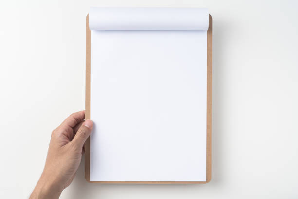 istock white flipped paper on clipboard isolated on white 1147444354