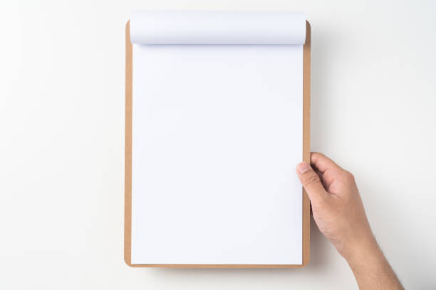 istock white flipped paper on clipboard isolated on white 1147444357