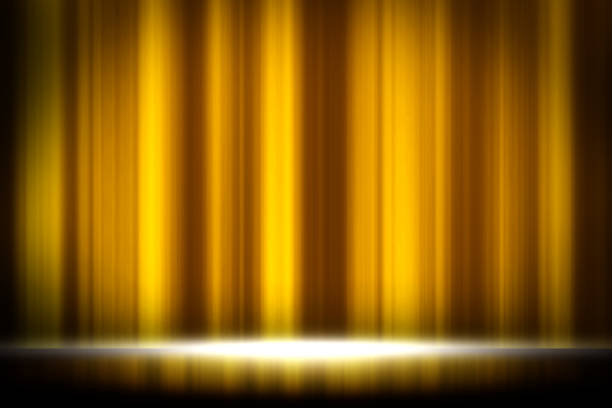 istock Yellow curtain studio entertainment background, Yellow curtain background. 1147451230
