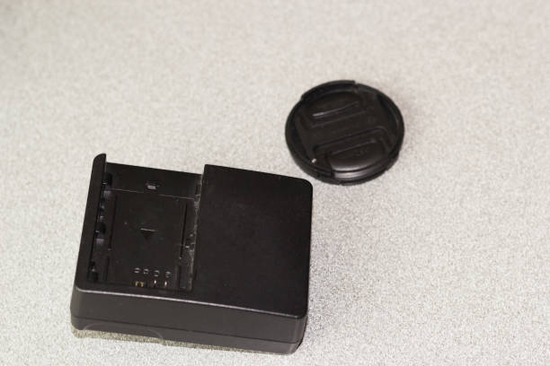 istock Battery charger with lens cap 1147456094