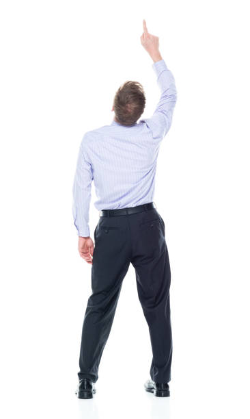 istock Handsome businessman dressed in nice clothing - pointing up 1147457477