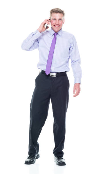 istock Handsome businessman dressed in nice clothing - talking on smart phone 1147457491