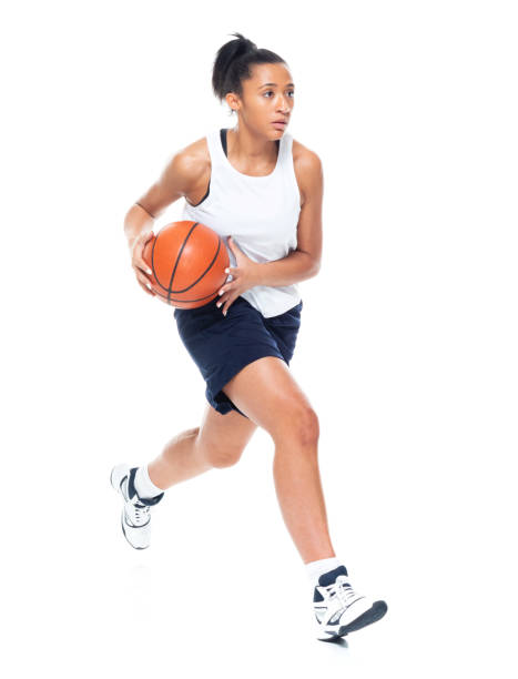 istock Attractive African American female playing basketball 1147458607