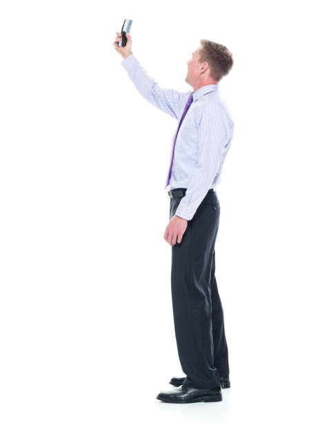 istock Handsome businessman dressed in nice clothing - taking a selfie 1147458649