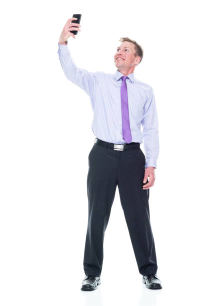 istock Handsome businessman dressed in nice clothing - taking a selfie 1147458752
