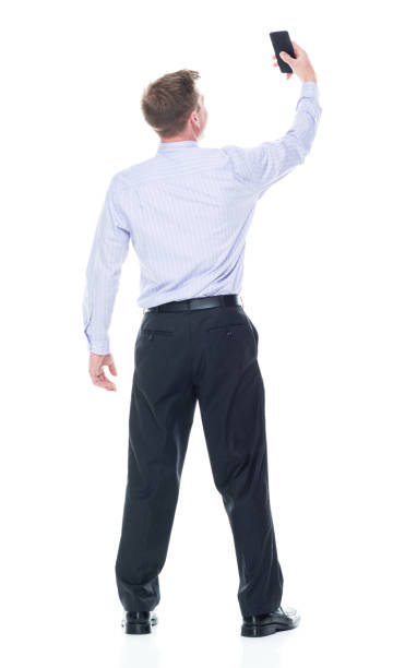 istock Handsome businessman dressed in nice clothing - taking a selfie 1147458837