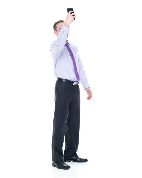 istock Handsome businessman dressed in nice clothing - taking a selfie 1147459504