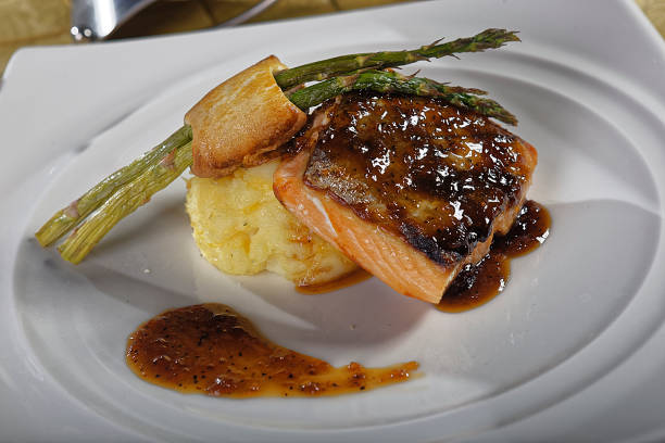 istock Roasted salmon fillet with potato puree and asparagus 1147461925