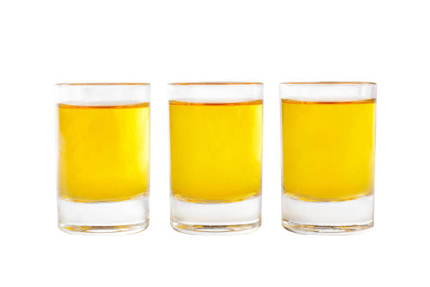 istock Summer yellow cocktail on isolated white background 1147464930