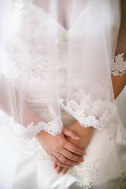 istock Bride dressed in white wedding gown waiting for bridegroom 1147466892